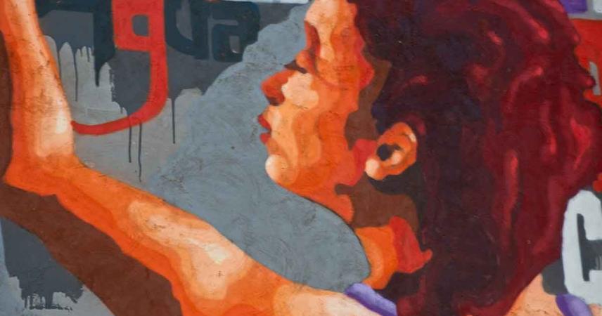 Peinture murale d&#39;une femme peignant un mur
